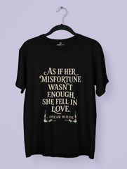 Vedawear Black t-shirt with white text on a hanger against a light purple background