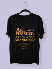 Art Is Never Finished Only Abandoned – Leonardo da Vinci Quote Premium Tee by Vedawear, crafted in Supima cotton with golden DTG print