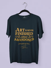 Art Is Never Finished Only Abandoned – Leonardo da Vinci Quote Premium Tee by Vedawear, crafted in Supima cotton with golden DTG print