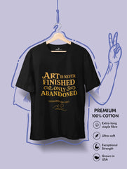 Art Is Never Finished Only Abandoned – Leonardo da Vinci Quote Premium Tee by Vedawear, crafted in Supima cotton with golden DTG print