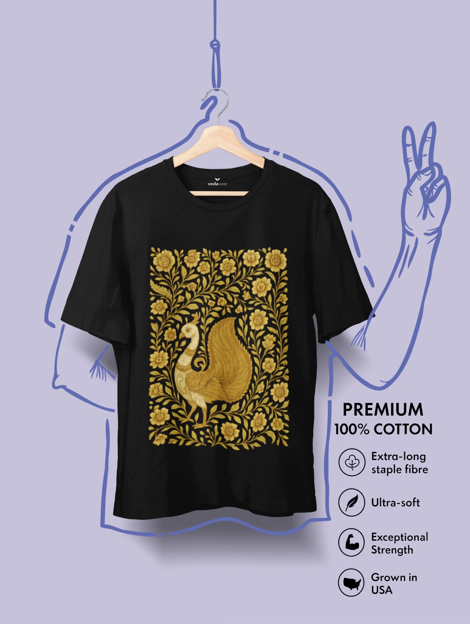 Kalamkari style golden peacock illustration surrounded by floral motifs on a black Vedawear premium T-shirt