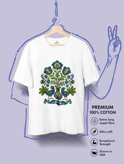 Hungarian folk art inspired premium cotton tee by Vedawear featuring bluebirds and floral motifs in indigo, green, and golden hues