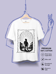 Innocence Under Fire – Anti-War Premium Tee by Vedawear, black silhouette of child under falling bombs framed in barbed wire, DTG printed on Supima cotton