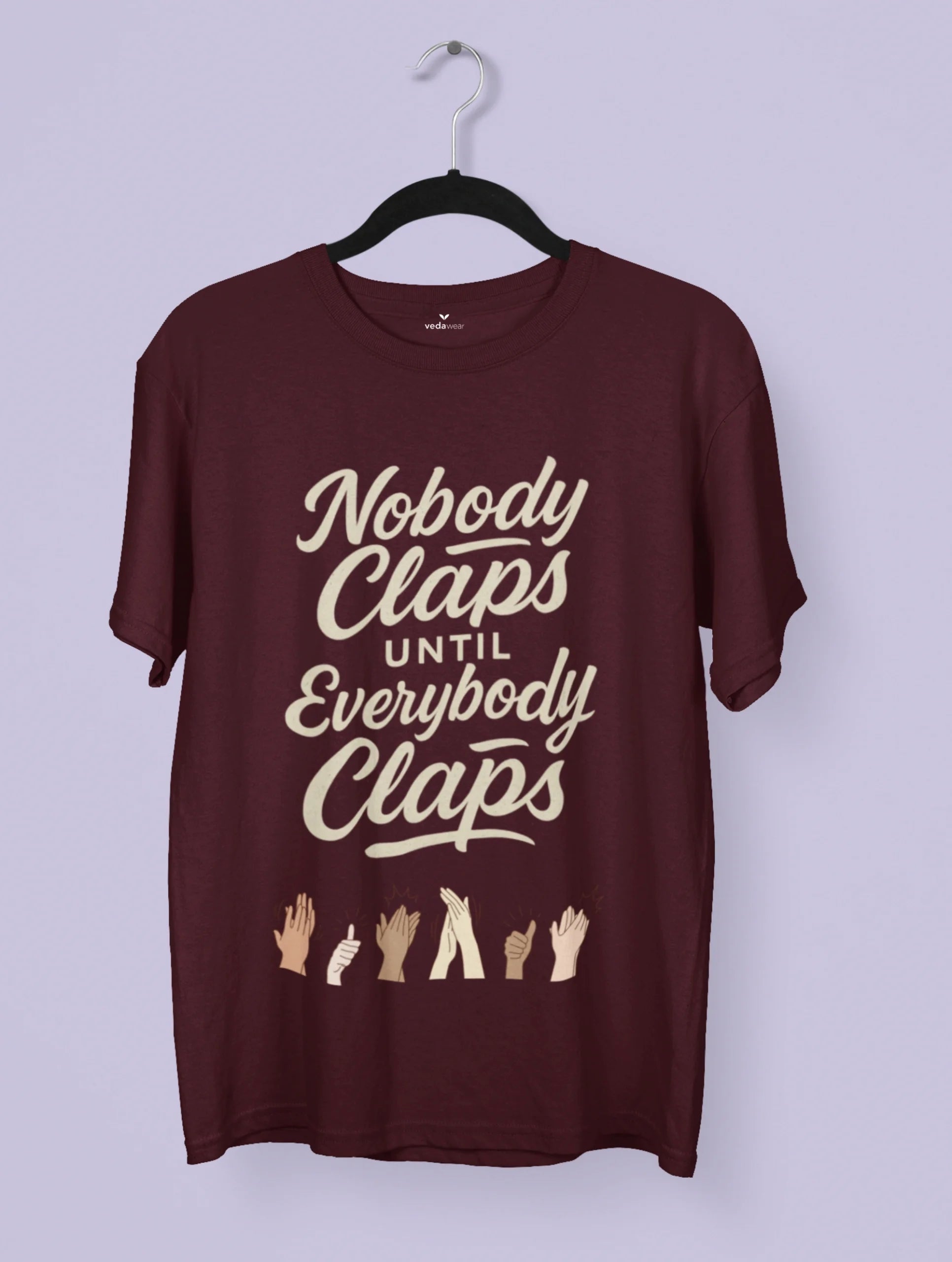 premium T-shirt with “Nobody Claps Until Everybody Claps” quote and diverse hands clapping – unity-themed Vedawear design.