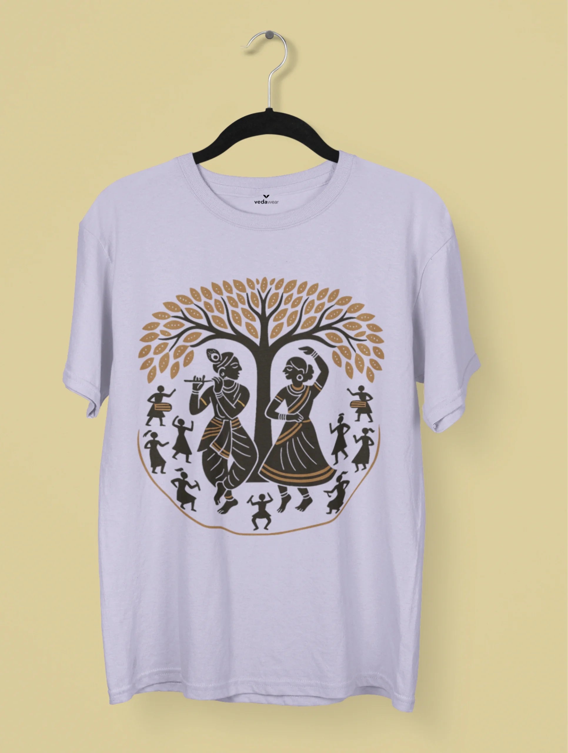 Sacred Melody – Patachitra Folk Art Premium Tee by Vedawear featuring Radha and Krishna under a sacred tree surrounded by dancers, inspired by traditional Odisha and Bengal Patachitra painting, printed on premium cotton.