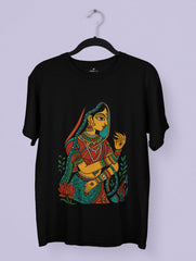 Madhubani folk art T-shirt design featuring a traditional Indian woman surrounded by lotus and fish motifs in vibrant colors