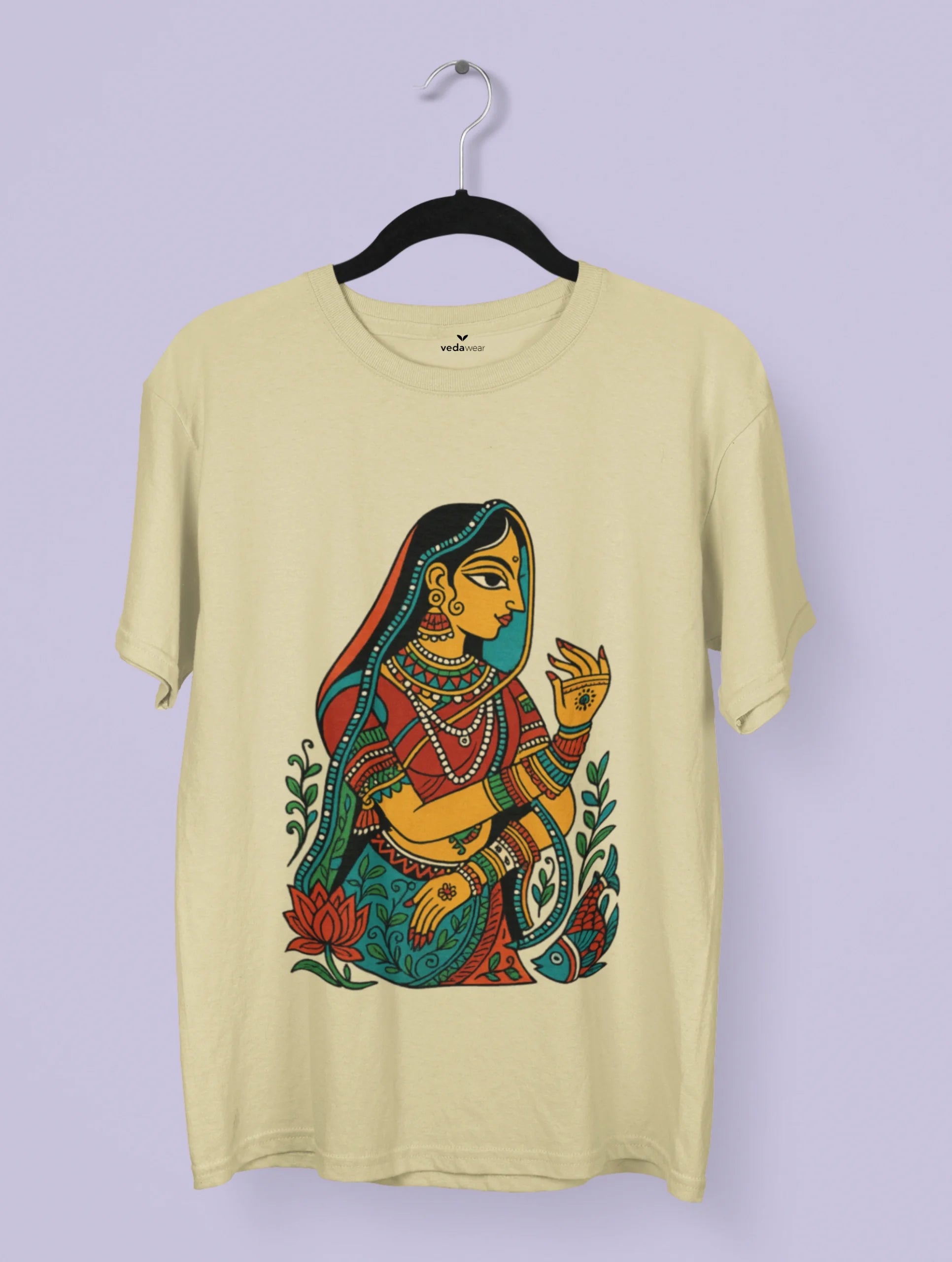 Madhubani folk art T-shirt design featuring a traditional Indian woman surrounded by lotus and fish motifs in vibrant colors