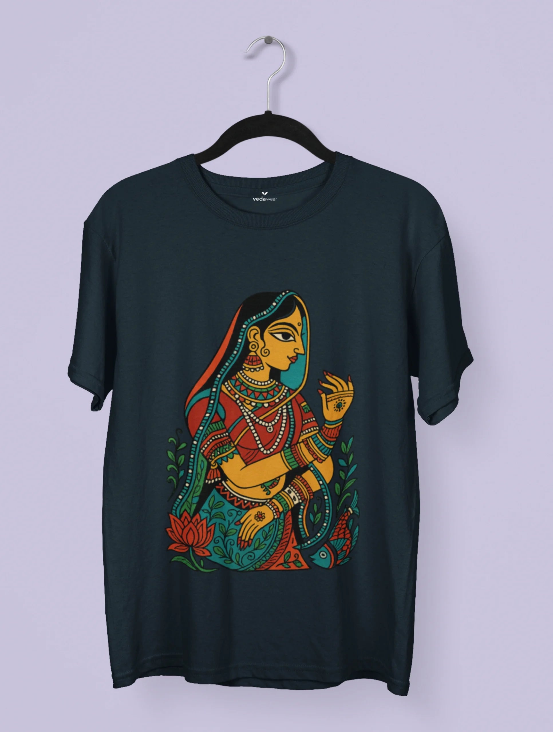 Madhubani folk art T-shirt design featuring a traditional Indian woman surrounded by lotus and fish motifs in vibrant colors